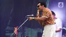 Penampilan David diiringi rintik hujan yang mengguyur kawasan Gelora Bung Karno Jakarta. (Liputan6.com/Herman Zakharia)