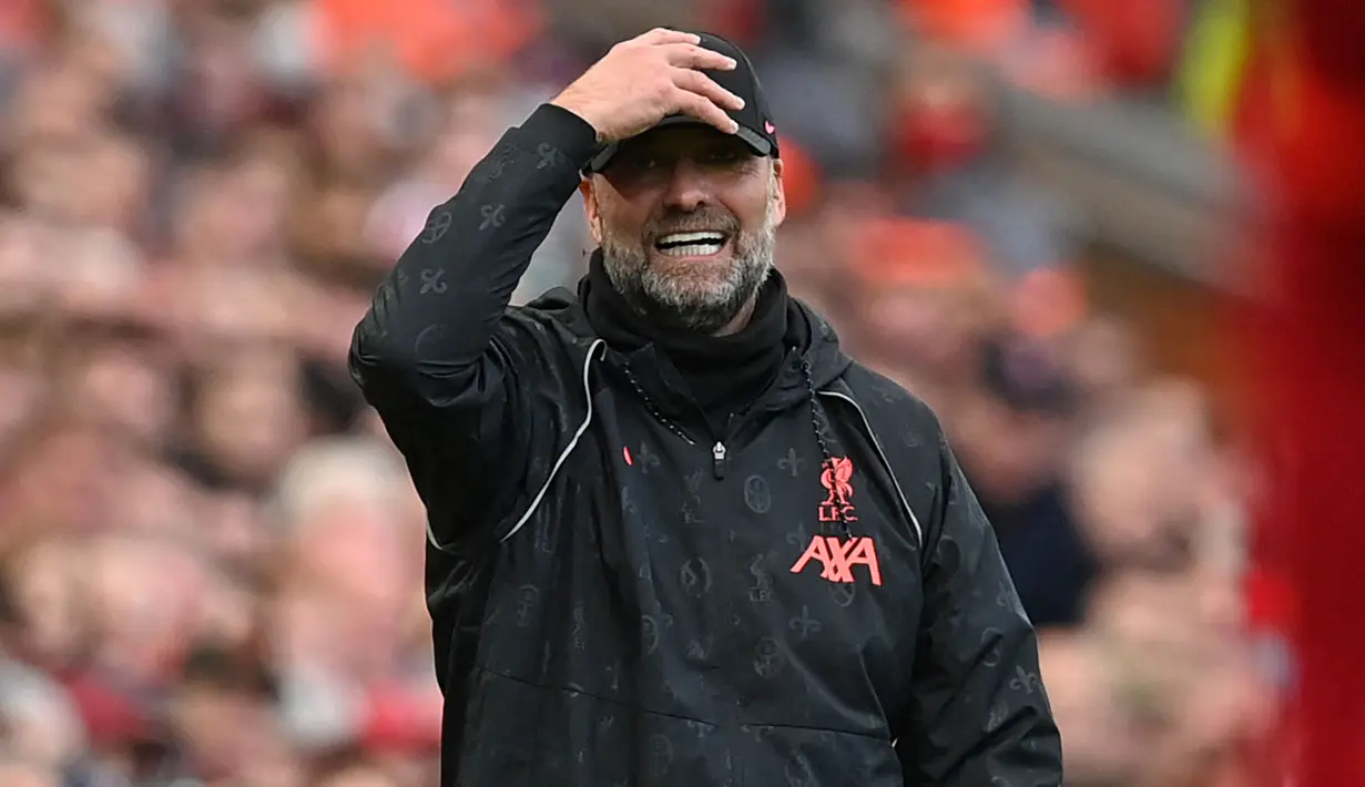 Di laga lain, Liverpool secara mengejutkan terkena comeback apik dari Brighton. Anak asuh Jurgen Klopp harus puas bermain imbang 2-2. (AFP/Paul Ellis)