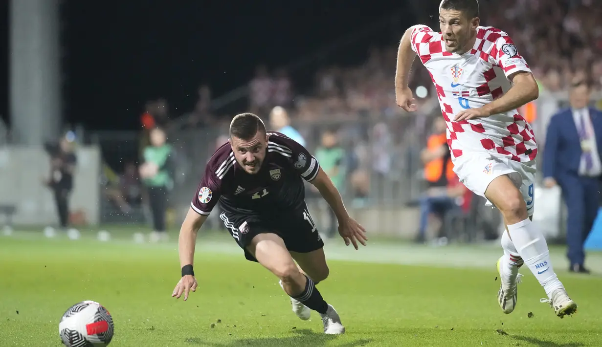 Masing-masing gol mereka saat itu berasal dari Bruno Petkovic, Luka Ivanusec, Andrej Kramaric , dan Mario Pasalic. (AP Photo/Darko Bandic)