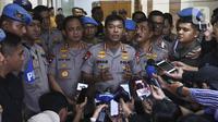 Kapolri Jenderal Polisi Idham Azis memberikan keterangan usai mengikuti rapat kerja perdana dengan Komisi III DPR di Kompleks Parlemen, Jakarta, Kamis (30/1/2020). (Liputan6.com/Johan Tallo)