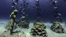 Pemandangan taman patung bawah laut MUSAM di Ayia Napa, Siprus, 18 September 2021. Menurut situs web museum, taman ini menjadi simbol untuk meningkatkan kisah Zona Perlindungan Laut yang baru dibuat Ayia Napa sambil mengakui praktik penggundulan hutan di masa lalu. (EMILY IRVING-SWIFT/AFP)