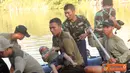 Citizen6, Surabaya: Prajurit Batalyon Intai Amfibi-1 Marinir membantu mencari korban tenggelam di Sungai Brantas Sepanjang Karangpilang Surabaya, Selasa (16/7). (Pengirim: Budi Abdillah).