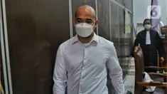 Terdakwa kasus merintangi penyidikan atau 'obstruction of justice' pembunuhan berencana terhadap Brigadir Nopriansyah Yosua Hutabarat atau Brigadir J, Baiquni Wibowo usai sidang putusan sela di Pengadilan Negeri Jakarta Selatan, Kamis (10/11/2022). Majelis Hakim menolak eksepsi atau nota keberatan yang diajukan oleh terdakwa Baiquni Wibowo. (Liputan6.com/Angga Yuniar)