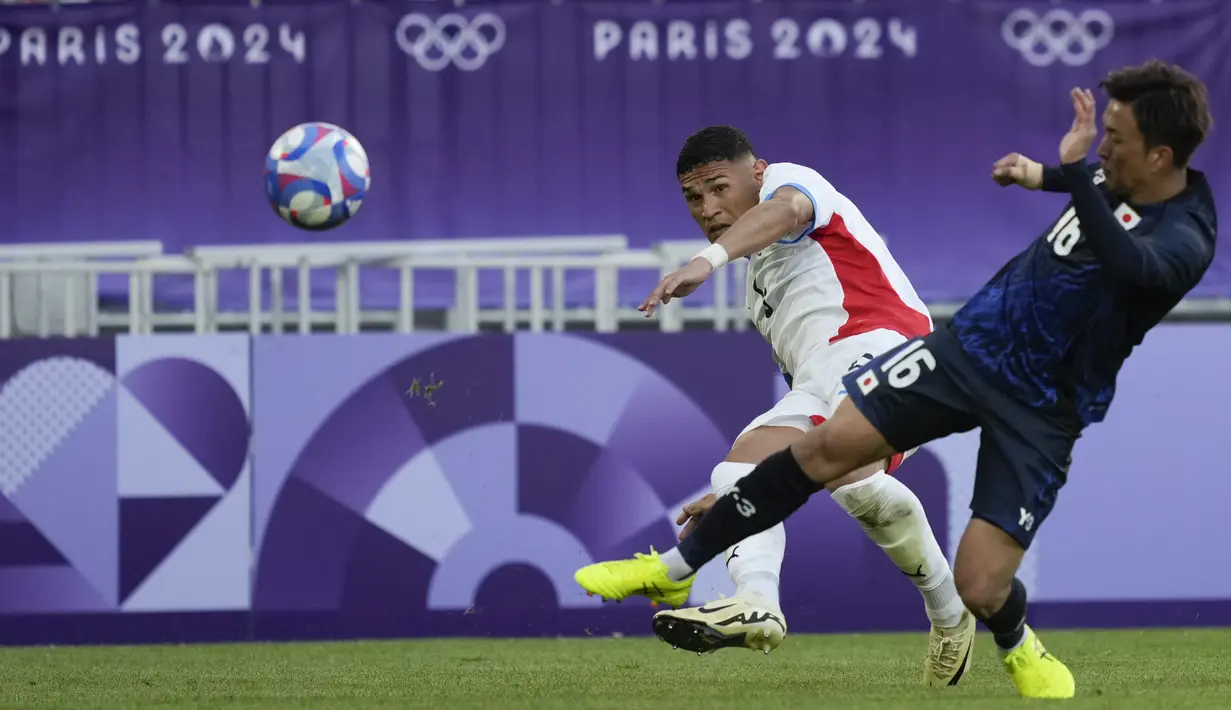 Jepang berhasil meraih kemenangan telak 5-0 atas Paraguay. (AP Photo/Moises Castillo)
