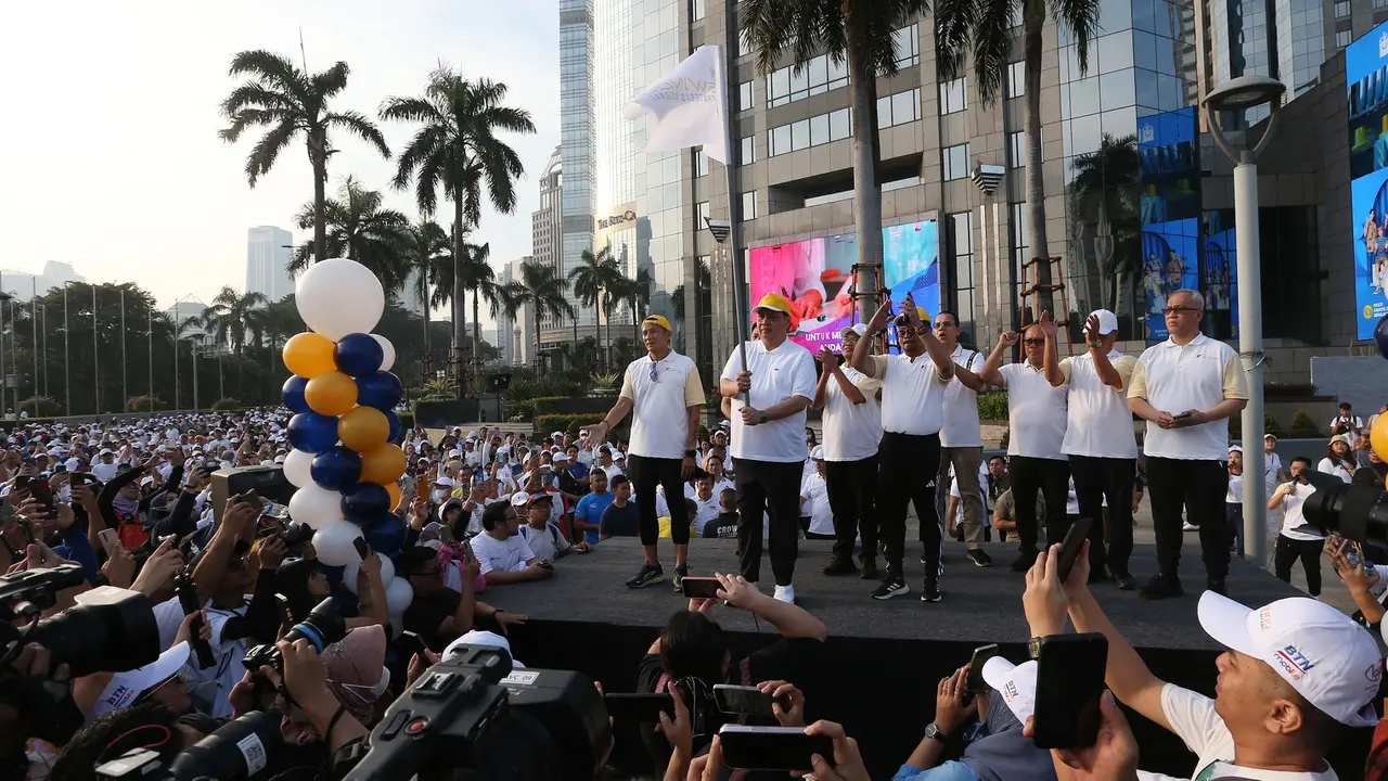 Sewindu PSN, Kemenko Perekonomian Gelar Fun Walk