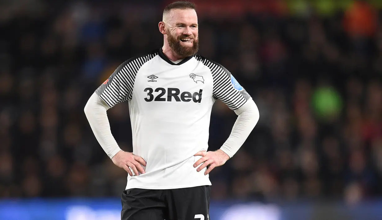 2. Wayne Rooney (208 gol) -  Wayne Rooney merupakan salah satu pemain yang sangat mematikan di daerah pertahanan lawan. Mantan pemain Manchester United yang kini berseragam Derby Country ini telah mengoleksi 260 gol selama berkarier di Liga Inggris. (AFP/Oli Scarff)