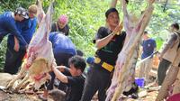 Makan daging kurban berlebihan bisa sebabkan GERD. Ketahui penyebab, gejala, dan cara mencegahnya agar pencernaan tetap sehat saat Idul Adha. (Foto: Aditya Eka Prawira/Liputan6.com)