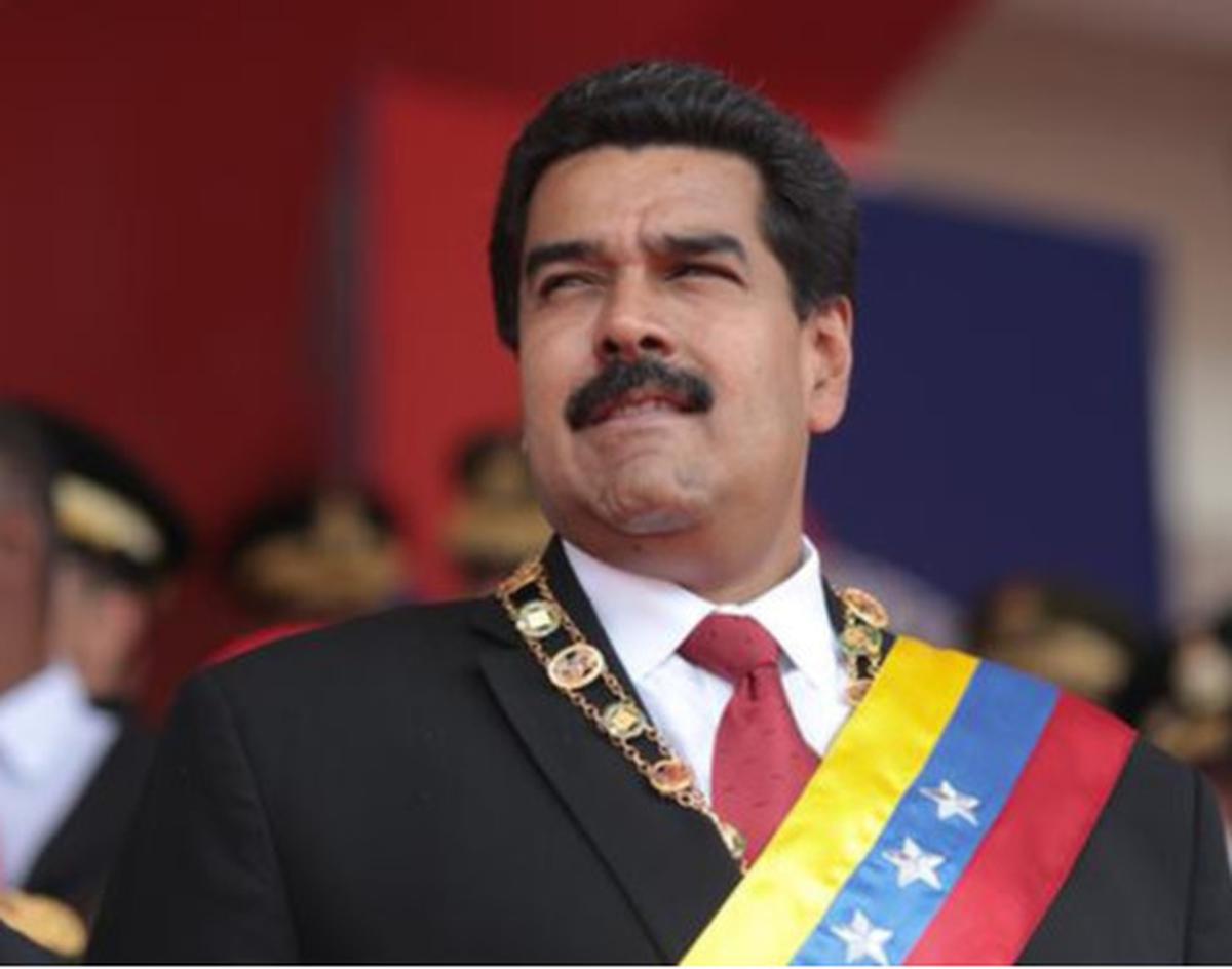 Presiden Nicola Maduro di hadapan rakyat Venezuela - AFP
