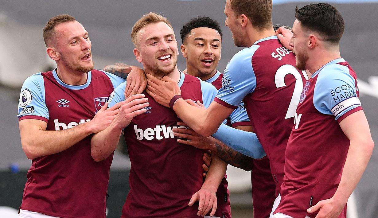 Jarrod Bowen berkontribusi dalam 35,55% gol West Ham di Liga Inggris musim ini. Pemain asal Inggris itu telah mencetak 8 gol dan membuat 10 assist dalam 26 penampilannya. Ia akan memainkan peranan vital dalam lima laga berikutnya saat menghadapi Liverpool, Tottenham, dan Wolves. (AFP/Justin Tallis)