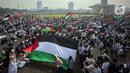 Untuk diketahui, acara ini dimulai sejak pukul 03.00 WIB. Fokus utama acara adalah untuk memanjatkan doa atas keselamatan NKRI dan Palestina. (Liputan6.com/Angga Yuniar)