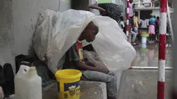 Badai Tropis Franklin menargetkan pulau Hispaniola yang berbagi dengan Haiti dan mengancam akan menyebabkan tanah longsor dan banjir besar. (AP Photo/ Odelyn Joseph)