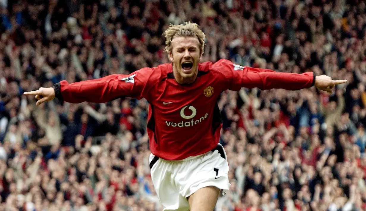 3. David Beckham - Beckham termasuk jajaran pemain terbaik Man United sejak tahun 1991 bersama Ryan Giggs dan Paul Scholes. Di Man United ia meraih segalanya dengan enam gelar Premier League dan satu Liga Champions. (AFP/Paul Barker)