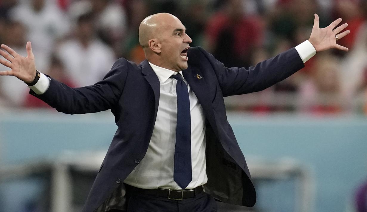 Namun usaha para pemain besutan Roberto Martinez untuk mencetak gol masih kandas oleh para pemain lini belakang Timnas Maroko yang bermain cukup disiplin. (AP/Christophe Ena)