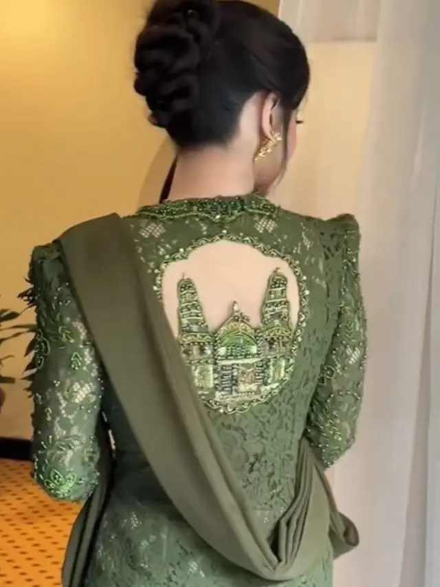6 Detail Penampilan Dewi Perssik Pakai Kebaya Hijau Zamrud di HUT TNI, Memukau