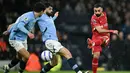 Winger asal Mesir itu tampil fantastis dengan kontribusi satu gol dan satu assist. (AFP/Paul Ellis)