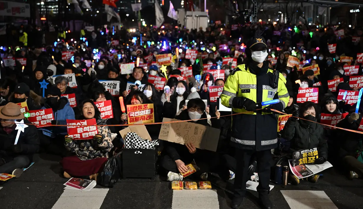 Sebelumnya, Presiden Yoon Suk Yeol berhasil lolos dari upaya pemakzulan di parlemen pada hari Sabtu (7/12/2024) lalu. (Jung Yeon-je/AFP)