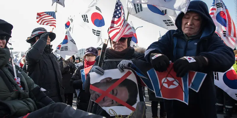 Rombongan Seni Korea Utara Disambut Demo Jelang Tampil di Pyeongchang