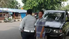 Seorang pengendara mencoba menyuap petugas saat mobilnya di derek.