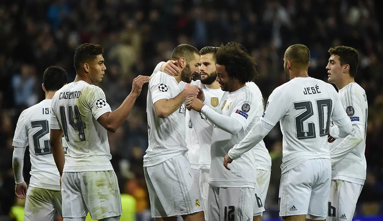 Juara grup A, Real Madrid. Klub asal Spanyol ini siap menambah gelar Liga Champions mereka yang ke-11. (AFP/Pierre-Philippe Marcou)