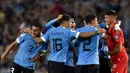 Sementara itu, berkat kemenangan mereka yang ketiga, Uruguay kini berada dua poin di belakang sang juara Piala Dunia 2022. (AP Photo/Gustavo Garello)