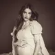 Barbara Palvin merilis maternity shoot di Instagram dengan lingerie arsip Victoria's Secret 1999 yang pernah dipakai Gisele Bündchen. (@therealbarbaraplavin)