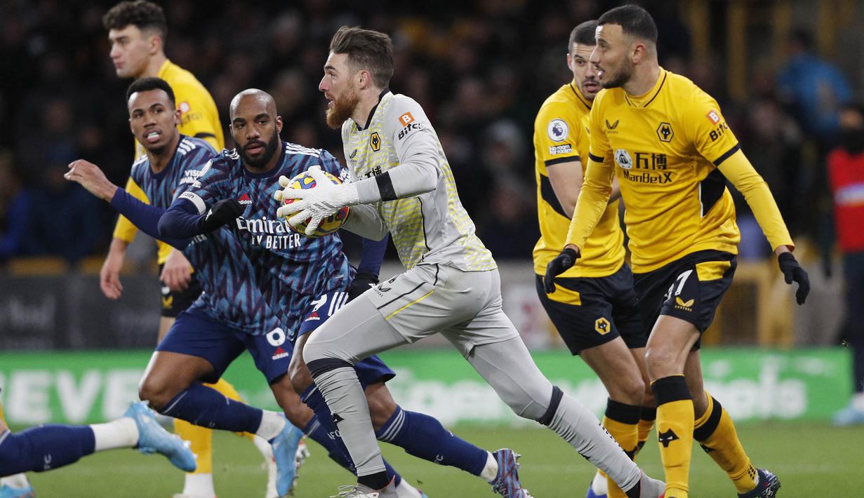 Berkat penampilan gemilangnya hingga pekan ke-24 Liga Inggris kiper asal Portugal itu berhasil membawa Wolves berada di posisi ke-7 klasemen sementara. (AFP/ Adrian Dennis)