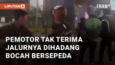 Seorang driver ojol terlibat perkelahian dengan bocah pesepeda. Bocah tersebut sedang asyik membuat video di jalur khusus sepeda