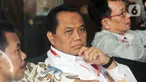 Direktur Operasional dan Pelayanan Publik Perum Bulog, Tri Wahyudi Saleh menunggu panggilan penyidik akan menjalani pemeriksaan sebagai saksi terkait kasus suap pengelolahan Distribusi gula di PTPN III di Gedung KPK, Jakarta, Selasa (17/12/2019). (merdeka.com/Dwi Narwoko)