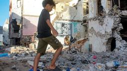 Tidak lama setelah dimulainya konflik berdarah antara pemerintah Yaman yang diakui secara internasional dan pasukan pemberontak Huthi, kota pelabuhan selatan Aden, tempat Rubil tinggal, menjadi tempat pertempuran brutal. (Saleh Al-OBEIDI / AFP)