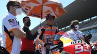Pembalap Repsol Honda, Marc Marquez jelang balapan MotoGP Portugal di Sirkuit Portimao, Minggu (18/04/2021). (PATRICIA DE MELO MOREIRA / AFP)