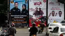 Baliho tiga pasang calon Pilkada DKI 2017terpasang di kawasan Tugu Tani, Jakarta, Minggu  (20/11). KPUD DKI Jakarta mulai memasang baliho berukuran 4 m x 6 m di sejumlah titik di ibu kota dengan total 30 buah baliho. (Liptan6.com/Faizal Fanani)