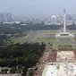 Suasana proyek revitalisasi Taman Sisi Selatan Monumen Nasional dilihat dari ketinggian, Jakarta, Minggu (19/1/2020). Proses revitalisasi kawasan Monas menggunakan skema multi-years dalam waktu tiga tahun dari 2019 hingga 2021. (Liputan6.com/Helmi Fithriansyah)