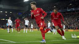 Liverpool. Roberto Firmino dkk baru saja memastikan penampilan ke-12 di semifinal Liga Champions usai menyingkirkan Benfica di perempatfinal musim 2021/2022. Dari 11 laga semifinal sebelumnya, The Reds sukses memenangkan 9 laga di antaranya. (AP/Jon Super)