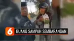 Warga ngamuk! Sepasang suami istri ini diberi sanksi menaruh sampah di atas kepala, akibat sering buang sampah sembarangan meski imbauan larangannya sudah terpampang.