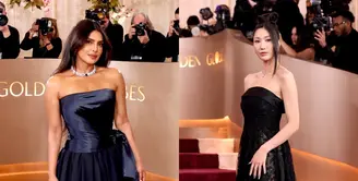 Salah satu yang paling menyita sorotan adalah Priyanka Chopra-Jonas. Ia tampil anggun dalam bustier satin navy berpotongan drapery yang dipadukan dengan rok sutra navy mengalir. Look ini menonjolkan kekuatan struktur khas couture Dior dengan sentuhan sensual yang refined. [Dok/DIOR].