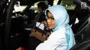Plt Dirut PLN (Persero) Sripeni Inten Cahyani usai bertemu Komisi VII DPR di Kompleks Parlemen, Senayan, Jakarta, Selasa (6/8/2019). Rapat Komisi VII DPR dengan PT PLN (Persero) terkait pemadaman listrik berlangsung tertutup. (Liputan6.com/JohanTallo)