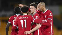 Para pemain Liverpool merayakan gol yang dibuat striker Diogo Jota (kedua dari kanan) ke gawang Wolverhampton Wanderers dalam laga lanjutan Liga Inggris 2020/2021 pekan ke-28 di Molineux Stadium, Senin (15/3/2021). Liverpool menang 1-0 atas Wolverhampton. (AP/Laurence Griffiths/Pool)