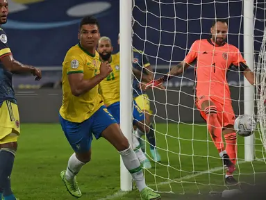 Casmeiro menjadi pahlawan Brasil pada pertandingan ini. Berkat dirinya, Brasil dapat membawa pulang poin penuh pada pertandingan ini dan semakin nyaman duduk di puncak klasemen sementara Grup B Copa America 2021. (Foto: AP/Silvia Izquierdo)