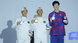 Atlet-atlet panjat tebing Indonesia menunjukkan kekuatan luar biasa di nomor speed, baik putra maupun putri, dengan berhasil mengawinkan medali emas dan perak. (Bola.com/Bagaskara Lazuardi)