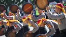 Upacara peringatan HUT ke-79 Bhayangkara di Banda Aceh mengangkat tema 'Polri untuk Masyarakat'. (CHAIDEER MAHYUDDIN/AFP)