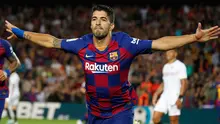 Penyerang Barcelona, Luis Suarez, berselebrasi setelah mencetak gol pembuka ke gawang Sevilla dalam pertandingan pekan kedelapan kompetisi La Liga Spanyol 2019-2020 di Camp Nou, Minggu (6/10/2019). Barcelona berhasil menang telak atas Sevilla dengan skor 4-0. (AP Photo/Joan Monfort)