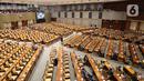 Suasana Rapat Paripurna ke-11 Masa Persidangan II Tahun Sidang 2021-2022 di Kompleks Parlemen, Jakarta, Kamis (16/12/2021). Rapat mengesahkan UU tentang perubahan atas UU Nomor 38 Tahun 2004 tentang Jalan serta penutupan Masa Persidangan II Tahun Sidang 2021-2022. (Liputan6.com/Angga Yuniar)