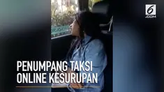 Sopir taksi online ini merekam aksinya menyembuhkan seorang penumpang yang kesurupan.