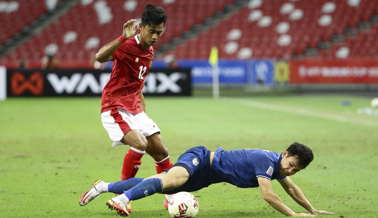 Pratama Arhan. Bek kiri Timnas Indonesia milik PSIS Semarang berusia 20 tahun yang tampil cemerlang dalam ajang Piala AFF 2020 dengan menyabet gelar pemain muda terbaik ini kabarnya tengah diminati oleh klub Korea Selatan yang berkompetisi di K-League 2, Daejeon Hana Citizen. (AP/Suhaimi Abdullah)