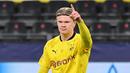 Penyerang Borussia Dortmund, Erling Braut Haaland, merayakan gol yang dicetaknya ke gawang Club Brugge pada laga lanjutan Liga Champions di Signal Iduna Park, Rabu (25/11/2020) dini hari WIB. Borussia Dortmund menang 3-0 atas Club Brugge. (AFP/Ina Fassbender)