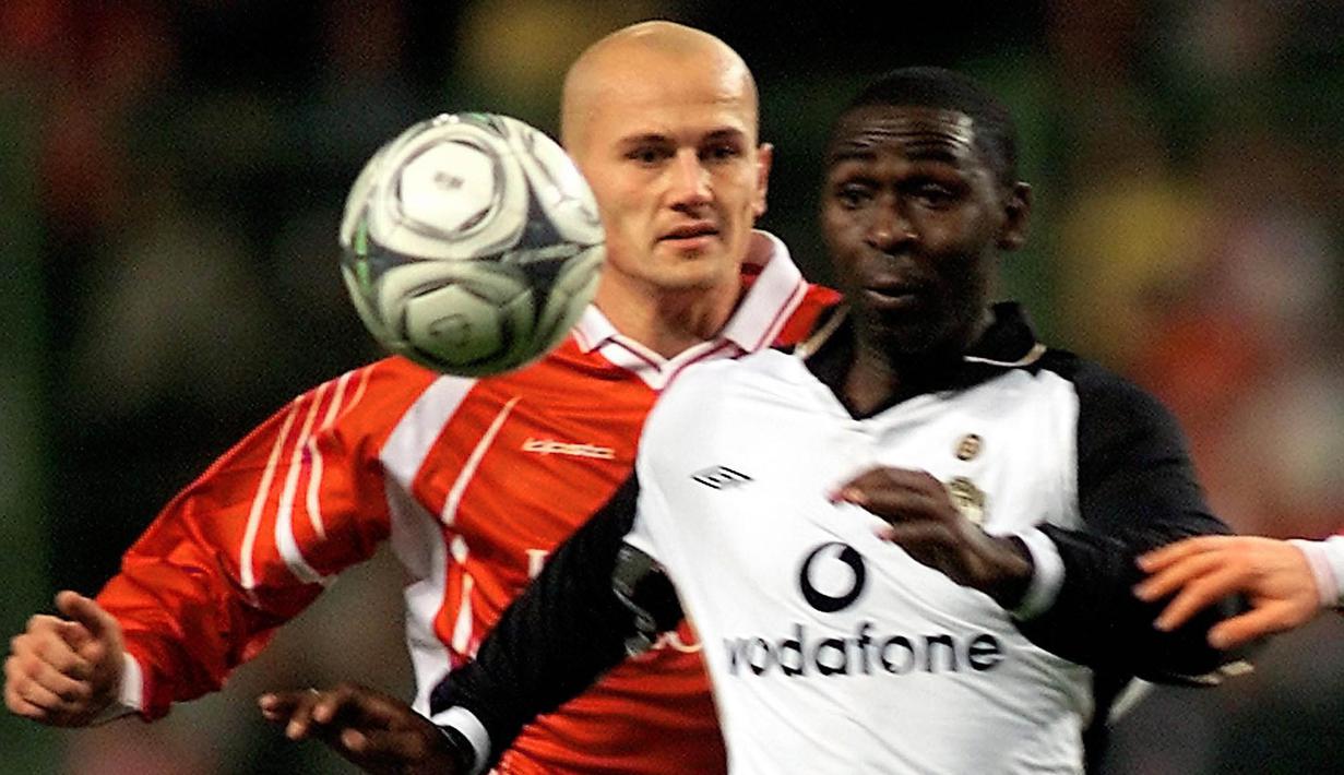 3. Andy Cole - Cole adalah salah satu striker tajam yang pernah dimiliki Manchester United. Di Liga Inggris, rekan tandem Dwight Yorke ini telah mencetak 187 gol dari 414 laga. (AFP/Philippe Huguen)