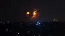 Bola api yang disebabkan oleh serangan udara Israel di Gaza City, Kamis (9/8). Israel mengatakan serangan di Gaza tidak ditargetkan ke warga sipil namun, kepada 100 target yang terkait kelompok Hamas. (AP Photo/Khalil Hamra)