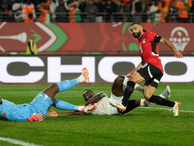 Kemenangan Mesir atas Pantai Gading pada laga perempat final Piala Afrika 2025, Sabtu (10/01/2026) waktu setempat, tak lepas dari peran Mohamed Salah. (AP Photo/Mosa'ab Elshamy)