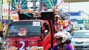 Suasana Karnaval Sosialisasi Pilkada Damai Kota Tangerang Selatan, Minggu (20/9/2015) KPUD Kota Tangsel mengajak masyarakat untuk mensukseskan Pilkada Serentak. (Liputan6.com/Helmi Afandi)
