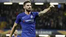 Striker Chelsea, Oliver Giroud, melakukan selebrasi usai membobol gawang PAOK Thessaloniki pada laga Liga Europa di Stadion Stamford Bridge, Kamis (29/11). Chelsea menang 4-0 atas PAOK Thessaloniki. (AP/Matt Dunham)